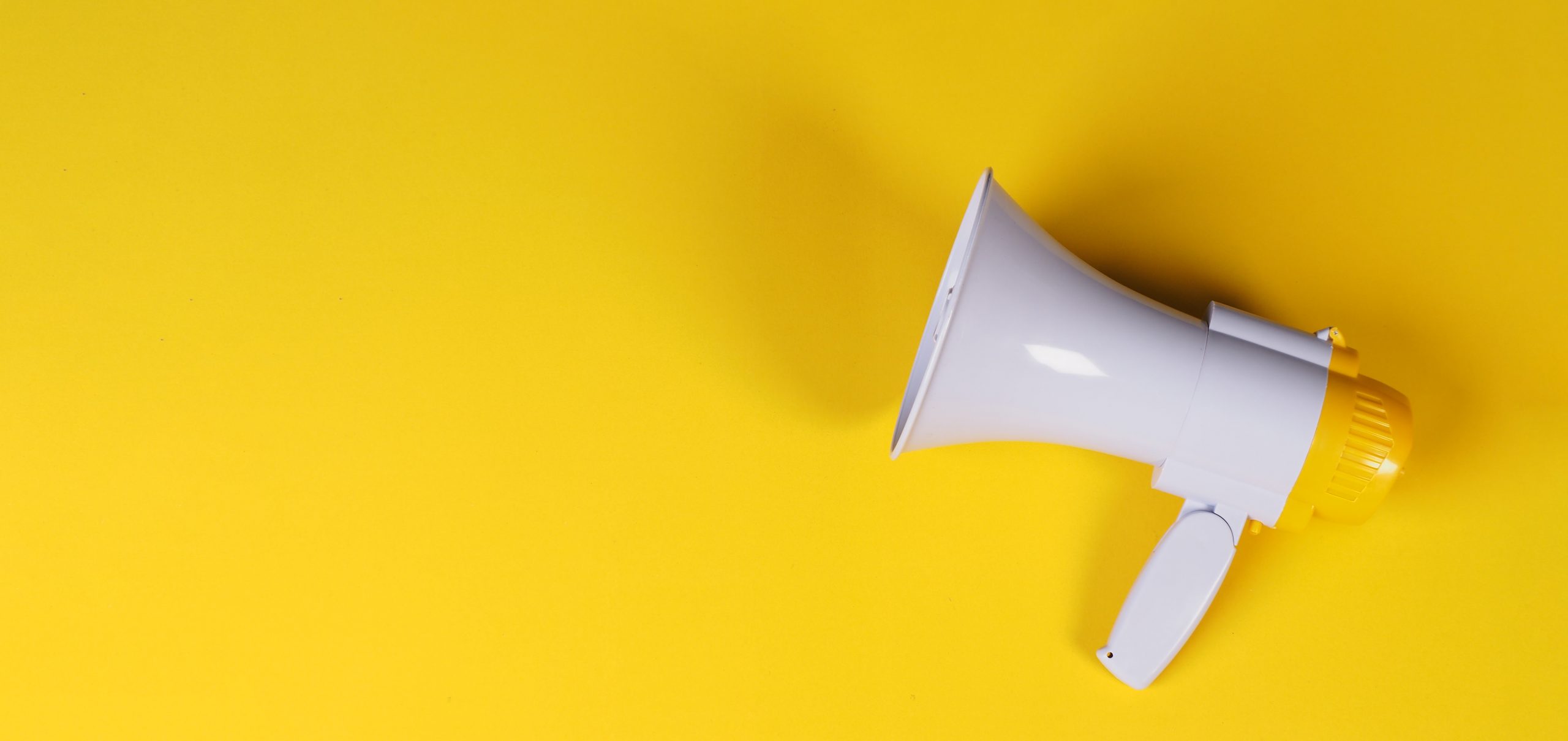 Megaphone on yellow background